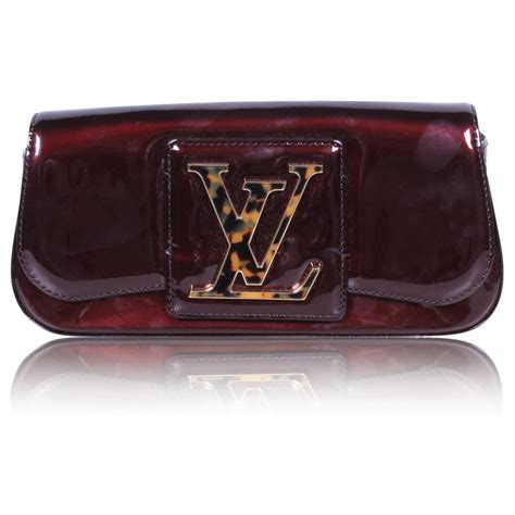 Sobe leather clutch bag Louis Vuitton Burgundy in Leather.